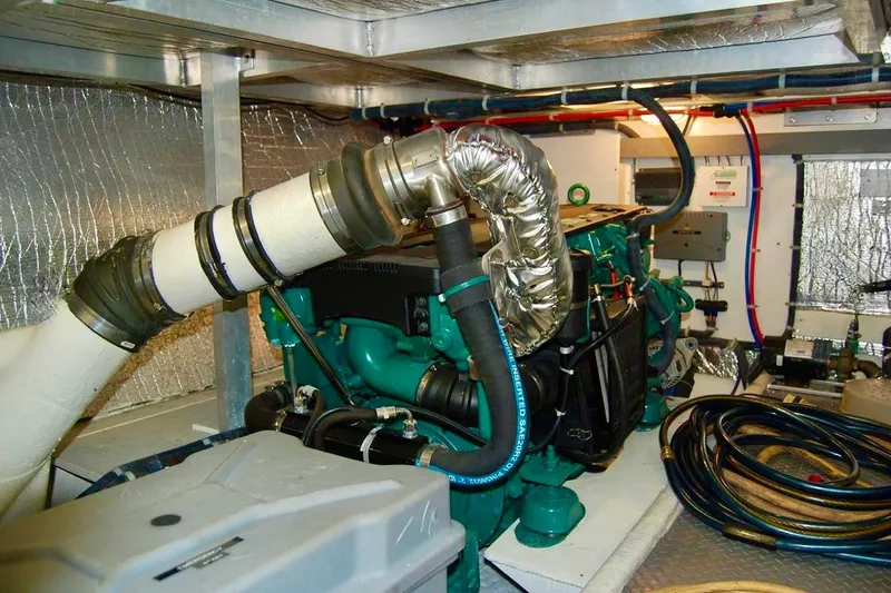 Slide: The Image of Engine room of 2007 Navigator 44 Classic yacht with visible piping and machinery. - 46