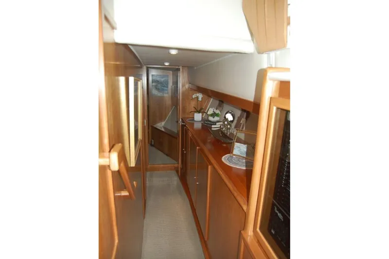 Slide: The Image of Interior hallway of 2007 Navigator 44 Classic yacht with wooden cabinetry and decor. - 21