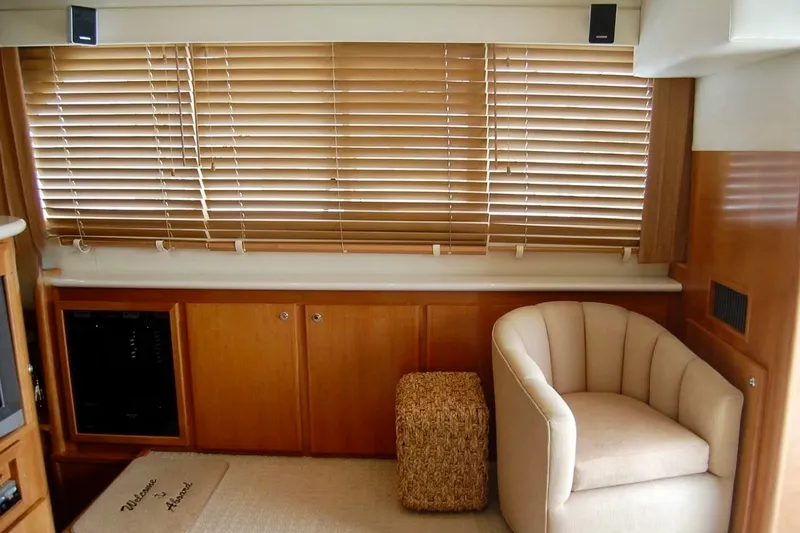 Slide: The Image of Interior of 2007 Navigator 44 Classic yacht with wooden blinds and cozy seating. - 10