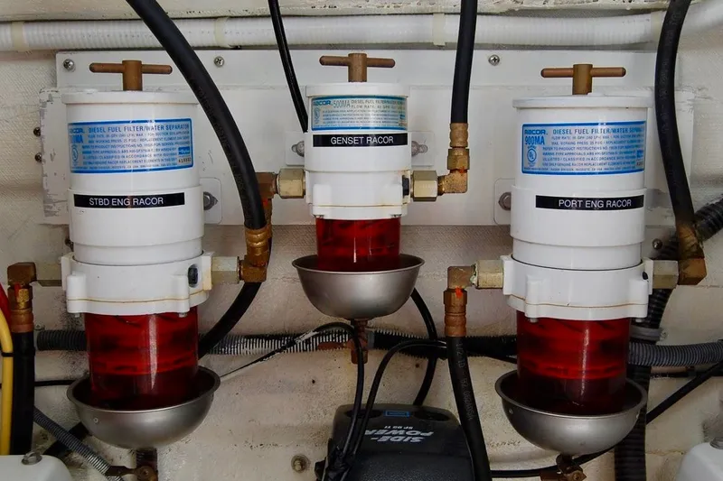 Slide: The Image of Diesel fuel filters in a 2007 Navigator 44 Classic engine room. - 51