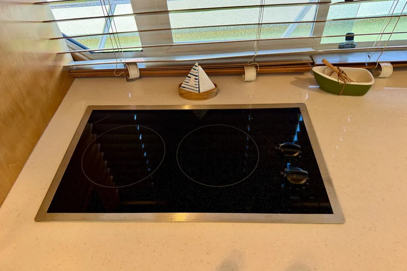 Slide: The Image of Modern stovetop in a 2007 Navigator 44 Classic yacht kitchen. - 25
