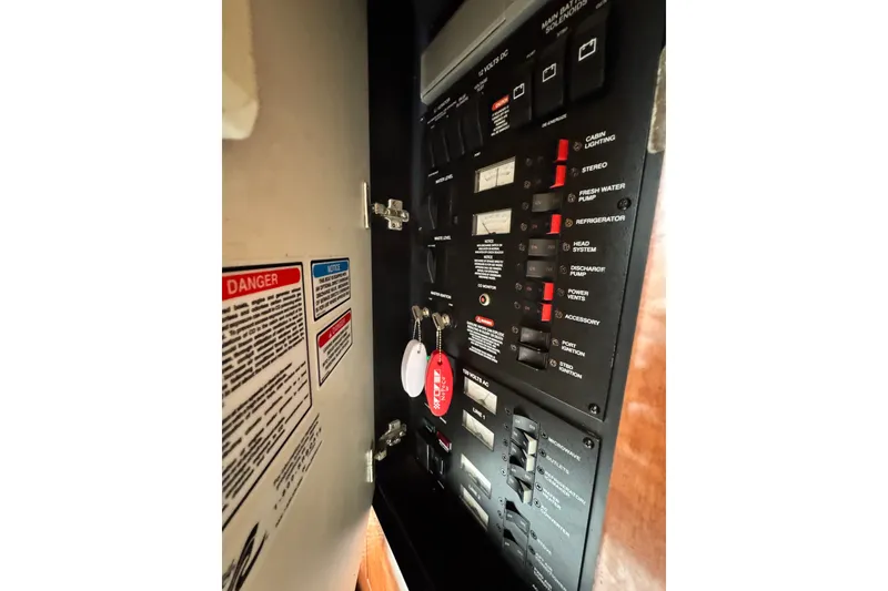 Slide: The Image of Electrical control panel on a 2005 Sea Ray 340 Sundancer boat. - 25