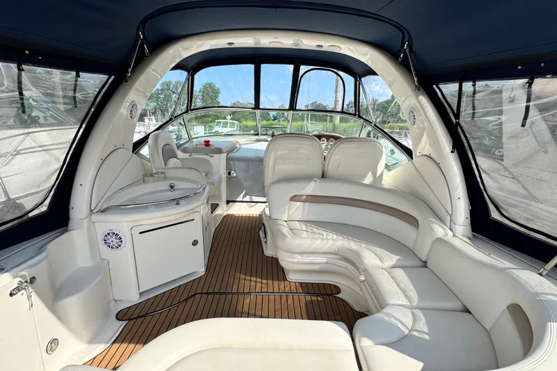 Slide: The Image of Luxurious interior of 2005 Sea Ray 340 Sundancer yacht with elegant seating and wood flooring. - 5