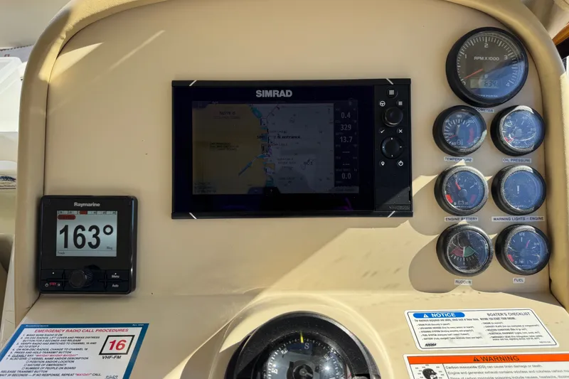 Slide: The Image of Control panel of 2006 Navigator 34 Californian boat with navigation and monitoring instruments. - 36