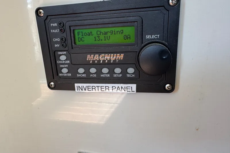 Slide: The Image of Inverter panel display on 2006 Navigator 34 Californian, showing float charging at 13.1V. - 41
