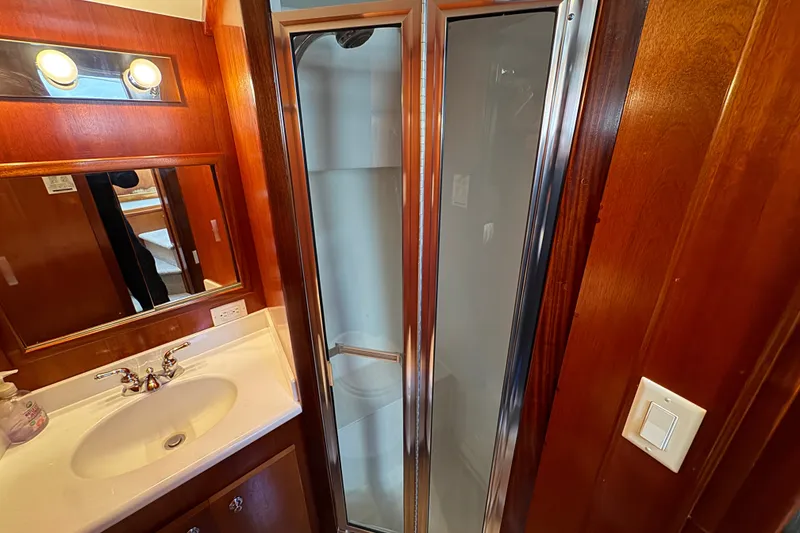 Slide: The Image of Bathroom interior of 2006 Navigator 34 Californian yacht with sink and shower. - 30