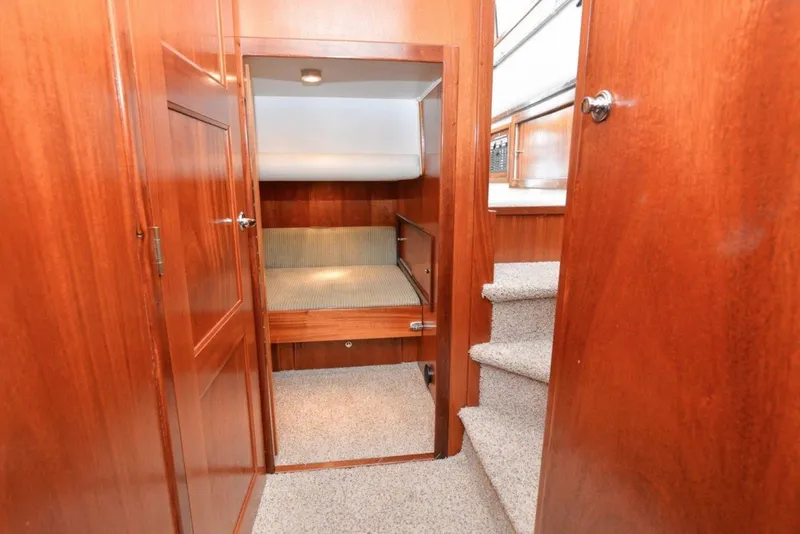 Slide: The Image of Interior of 2006 Navigator 34 Californian yacht with wooden finish and cozy cabin. - 29