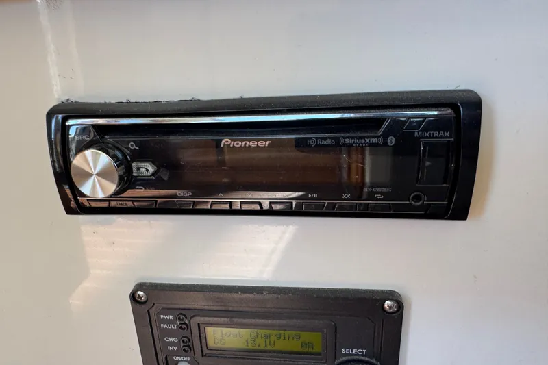 Slide: The Image of Pioneer stereo system in 2006 Navigator 34 Californian boat interior. - 40