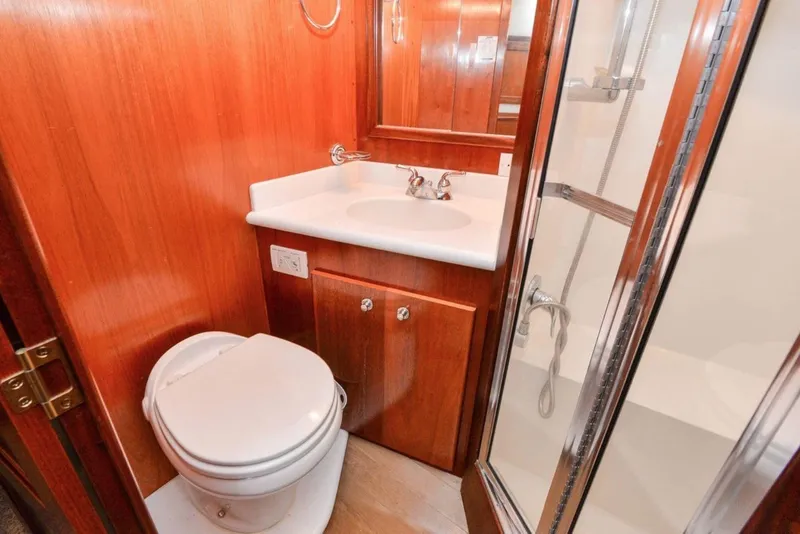 Slide: The Image of Bathroom interior of 2006 Navigator 34 Californian yacht with shower, sink, and toilet. - 24