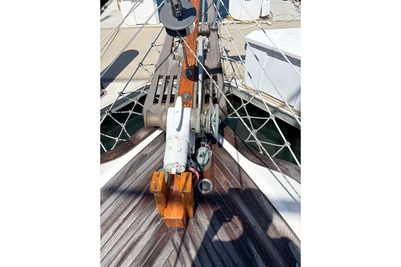 Slide: The Image of 1973 Westsail 32 sailboat deck with winch and rigging details. - 4