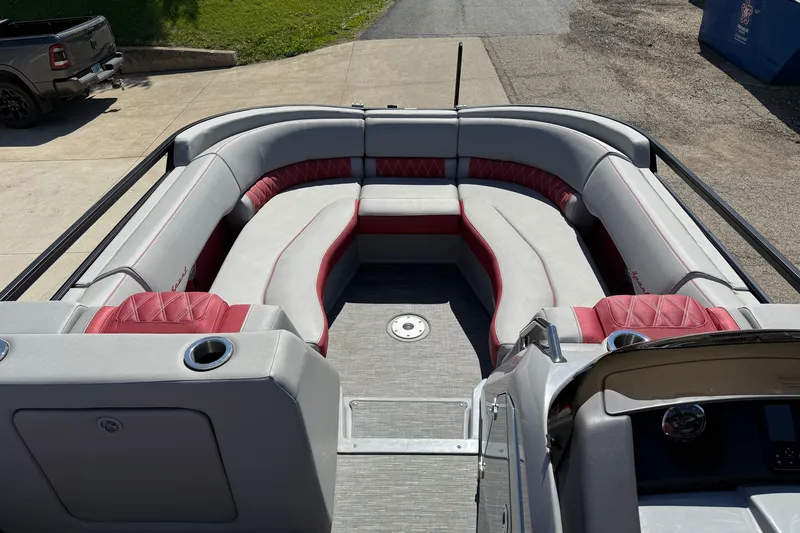 Slide: The Image of 2022 Bennington R 24 Quad Bench Bowrider with spacious seating and modern design. - 10