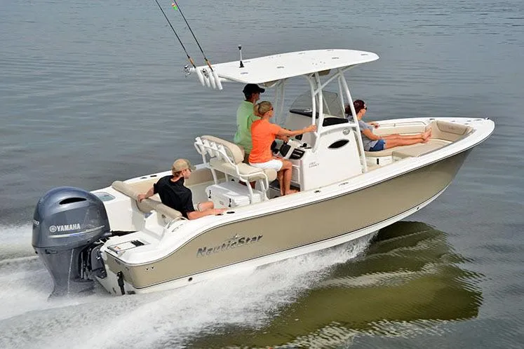 Slide: The Image of Manufacturer Provided Image: 2018 NauticStar 2302 Legacy boat cruising with passengers on calm water. - 9