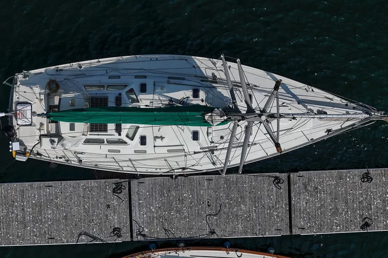 Slide: The Image of Aerial view of 1993 Van De Stadt Samoa 47 yacht docked at a pier. - 4
