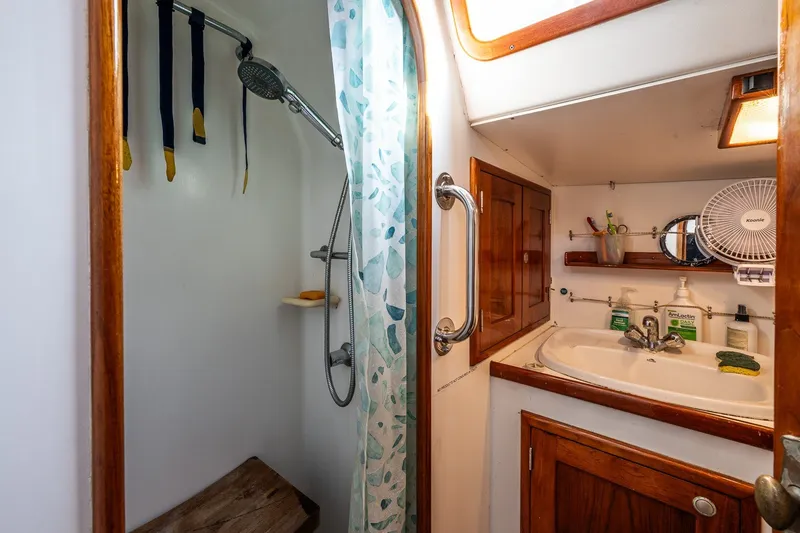 Slide: The Image of Bathroom interior of 1993 Van De Stadt Samoa 47 yacht, featuring shower and sink area. - 21