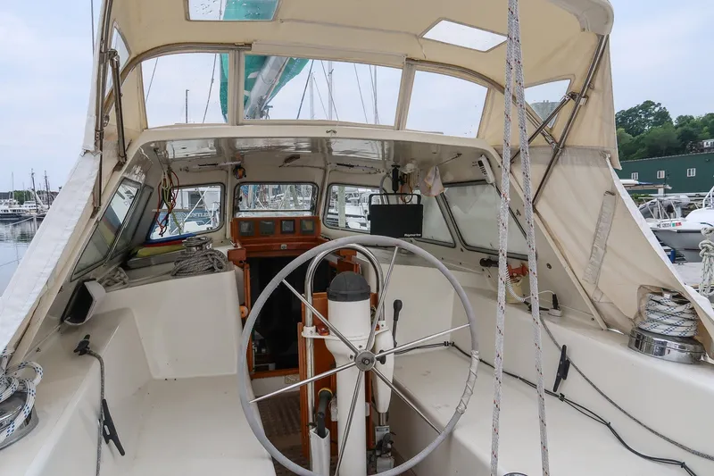 Slide: The Image of Cockpit of 1993 Van De Stadt Samoa 47 sailboat with steering wheel and navigation instruments. - 13