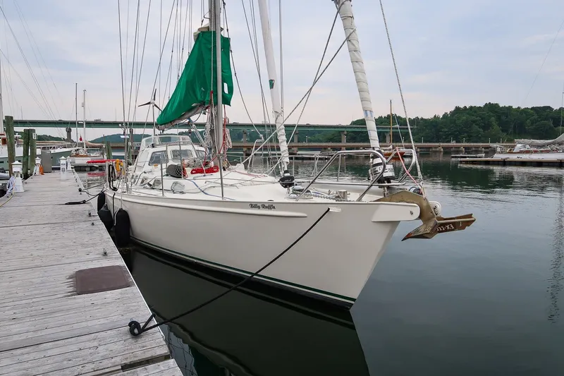 The Image of Sailing yacht Van De Stadt Samoa 47, 1993 model, docked at a marina. - 2