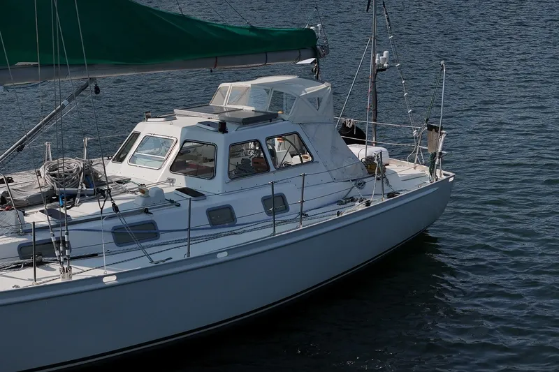 Slide: The Image of Sailing yacht Van De Stadt Samoa 47, 1993 model, anchored on calm water. - 8