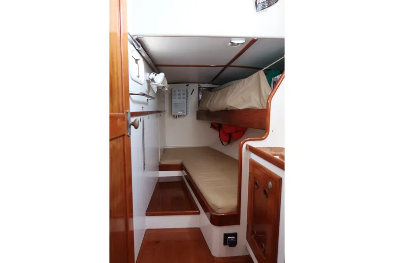 Slide: The Image of Cozy cabin interior of 1993 Van De Stadt Samoa 47 sailboat with wooden finishes. - 18