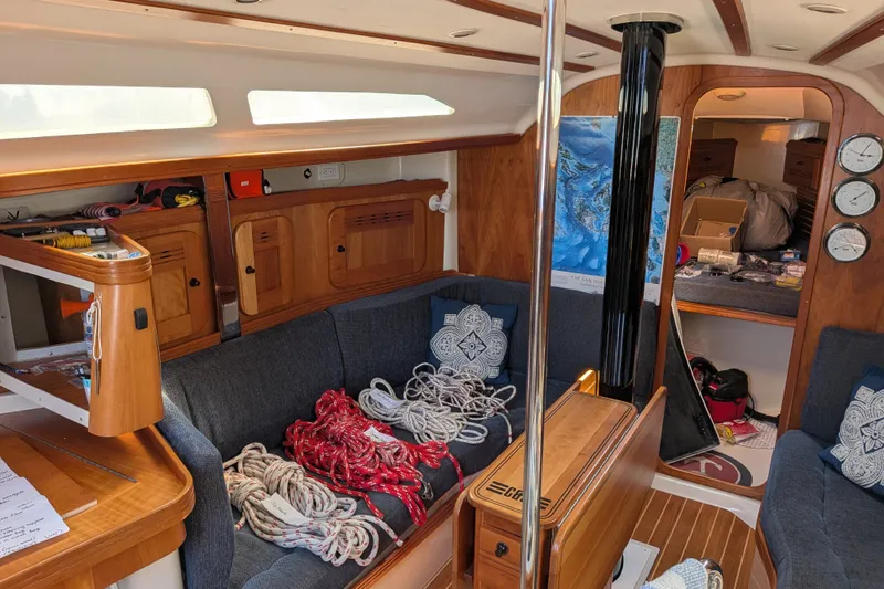 Slide: The Image of Interior of a 2005 C&C 115 sailboat with ropes and nautical decor. - 31