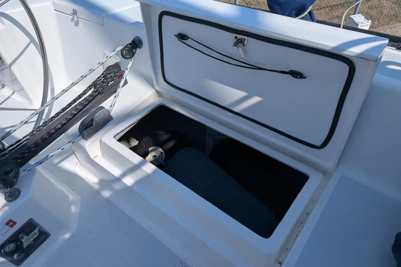 Slide: The Image of Open storage compartment on a 2005 C&C 115 sailboat deck. - 17
