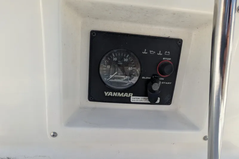 Slide: The Image of Yanmar engine control panel on a 2005 C&C 115 sailboat. - 15