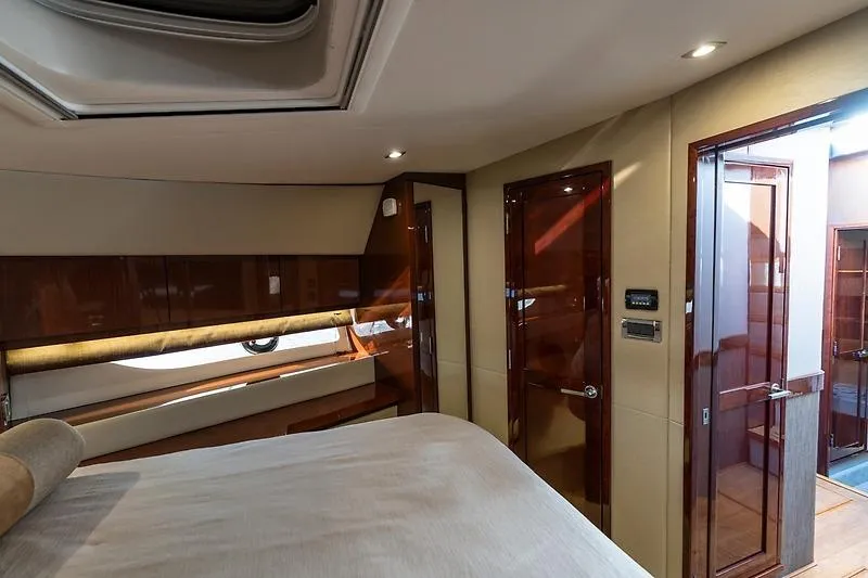 Slide: The Image of Luxurious interior of 2016 Sea Ray 510 Fly yacht with elegant wood finishes. - 18
