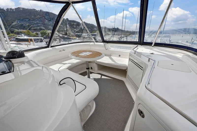 Slide: The Image of Luxurious 2007 Sea Ray 58 Sedan Bridge yacht interior with panoramic marina view. - 63