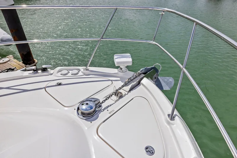 Slide: The Image of Bow of 2007 Sea Ray 58 Sedan Bridge yacht with anchor and railing. - 70