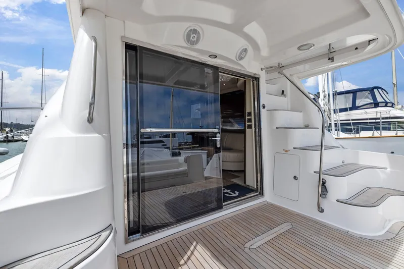 Slide: The Image of 2007 Sea Ray 58 Sedan Bridge yacht with sleek deck and modern interior. - 31