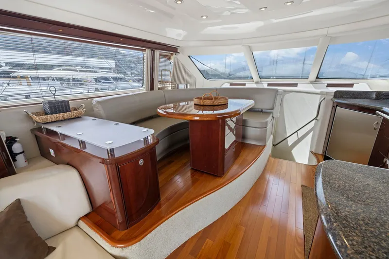 Slide: The Image of Luxurious interior of 2007 Sea Ray 58 Sedan Bridge yacht with elegant wood finishes. - 35