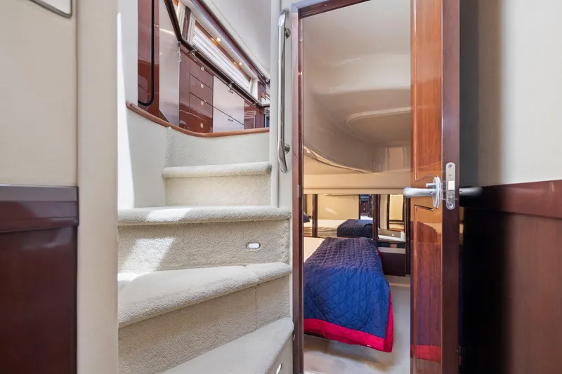 Slide: The Image of Interior of 2007 Sea Ray 58 Sedan Bridge yacht with stairs and bedroom view. - 44