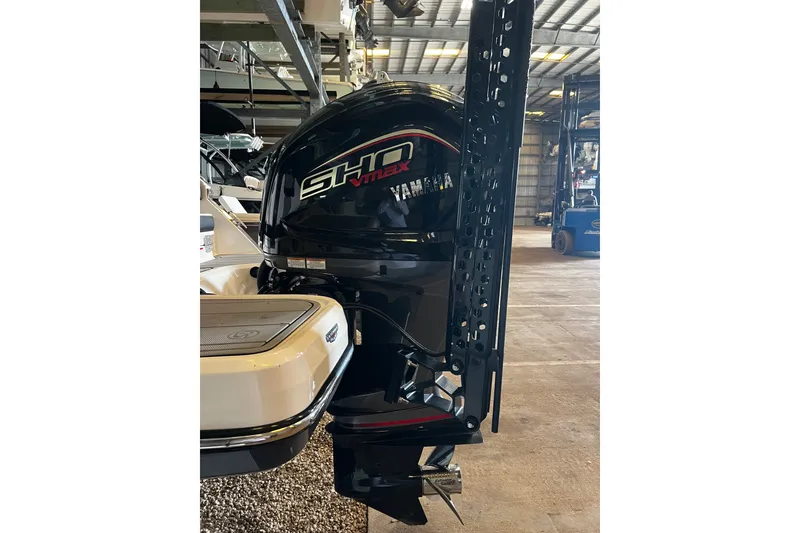 Slide: The Image of 2024 Chaparral 250 OSX with Yamaha SHO VMAX outboard engine in storage facility. - 21
