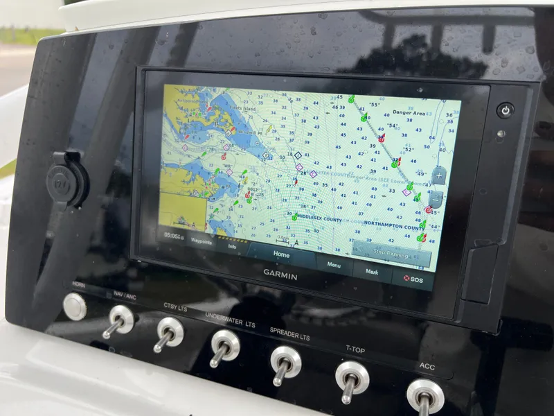 Slide: The Image of A Garmin navigation system on a Sportsman Open 232 Center Console boat. - 19