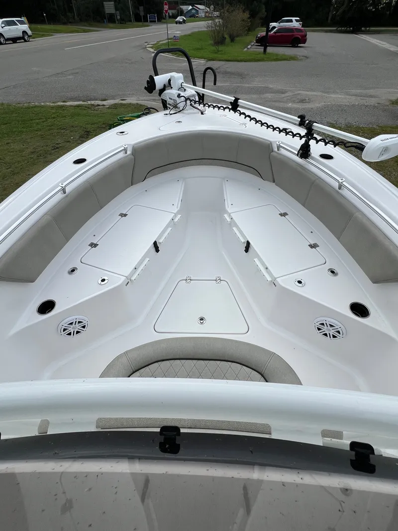 Slide: The Image of The image shows the bow area of a 2021 Sportsman Open 232 Center Console boat. - 37