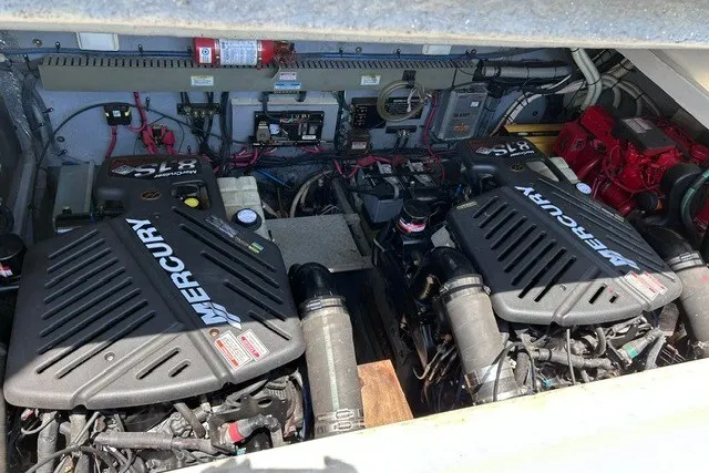 Slide: The Image of Engine compartment of a 2001 Sea Ray 340 Amberjack with twin Mercury engines. - 3