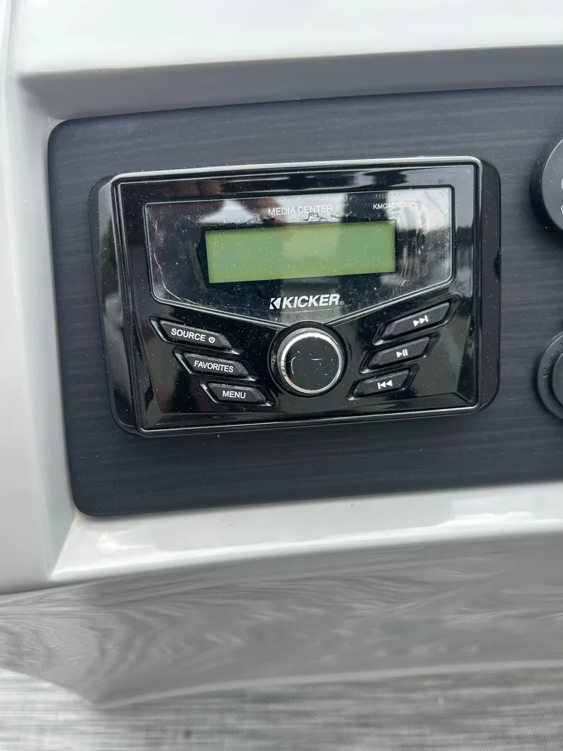 Slide: The Image of Close-up of a Kicker audio system on a boat. - 12