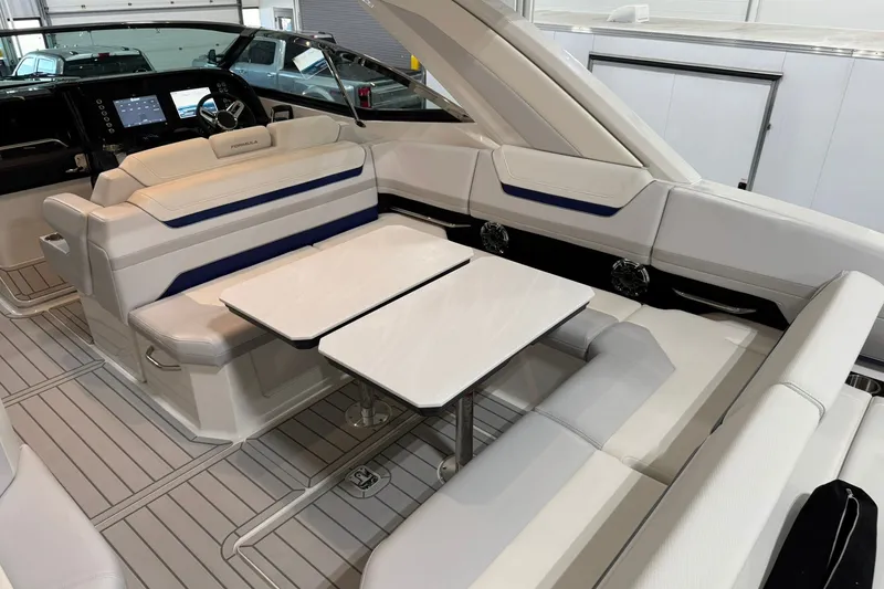 Slide: The Image of 2026 Formula 360 Crossover Bowrider I/O interior with luxurious seating and modern dashboard. - 66