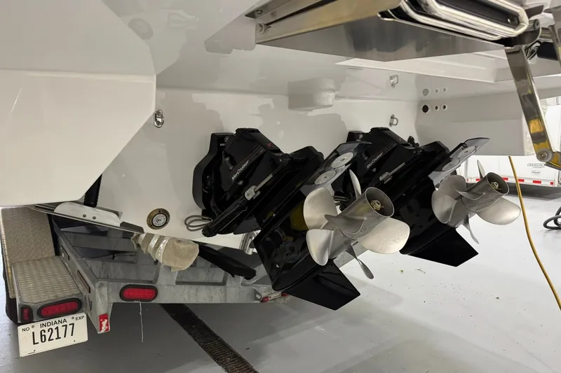 Slide: The Image of Rear view of 2026 Formula 360 Crossover Bowrider I/O with dual propellers on trailer. - 131