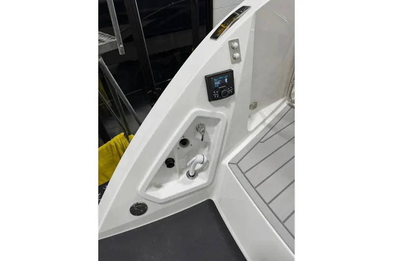 Slide: The Image of 2026 Formula 360 Crossover Bowrider I/O interior detail with control panel and deck. - 25