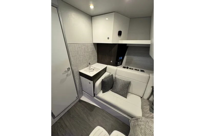Slide: The Image of Interior of 2026 Formula 360 Crossover Bowrider I/O, featuring modern seating and compact sink. - 139