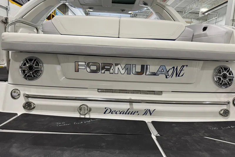 Slide: The Image of 2026 Formula 360 Crossover Bowrider I/O boat rear view, Decatur, IN branding. - 19