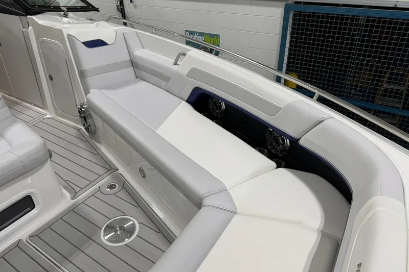 Slide: The Image of 2026 Formula 360 Crossover Bowrider I/O interior with sleek white seating and modern design. - 101