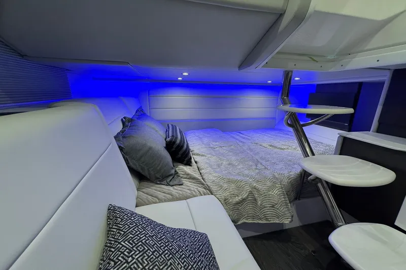 Slide: The Image of Luxurious interior of 2026 Formula 360 Crossover Bowrider I/O with modern lighting and cozy bedding. - 153