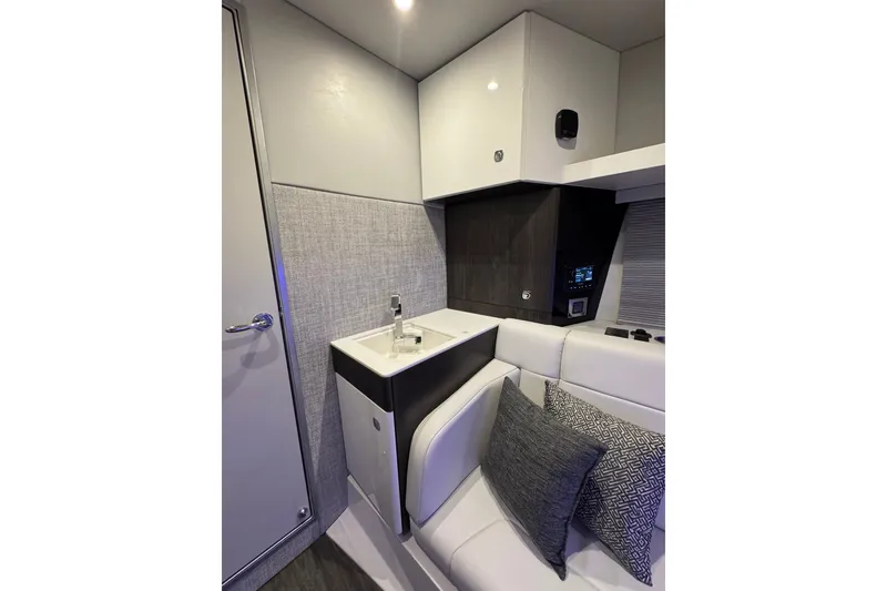 Slide: The Image of Interior of 2026 Formula 360 Crossover Bowrider I/O with modern sink and seating area. - 171