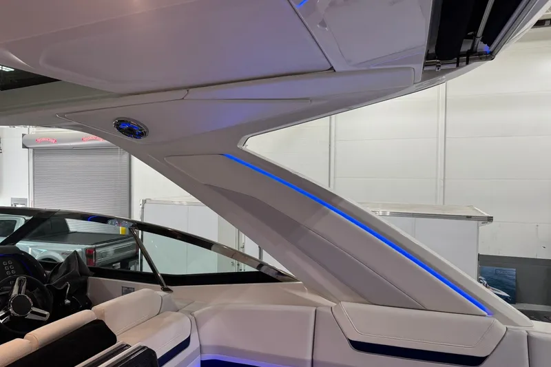 Slide: The Image of Interior view of 2026 Formula 360 Crossover Bowrider I/O with sleek design and blue LED lighting. - 11