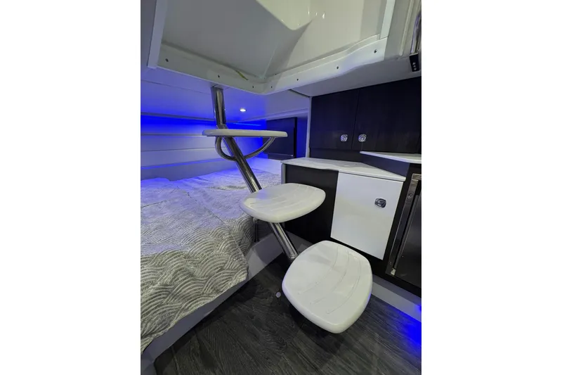 Slide: The Image of Interior of 2026 Formula 360 Crossover Bowrider I/O with modern design and blue LED lighting. - 160