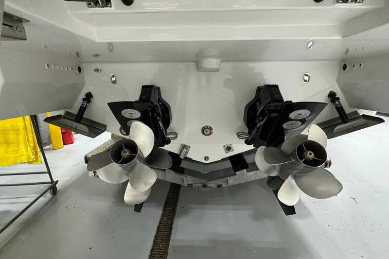 Slide: The Image of 2026 Formula 360 Crossover Bowrider I/O with dual propellers in a garage setting. - 130
