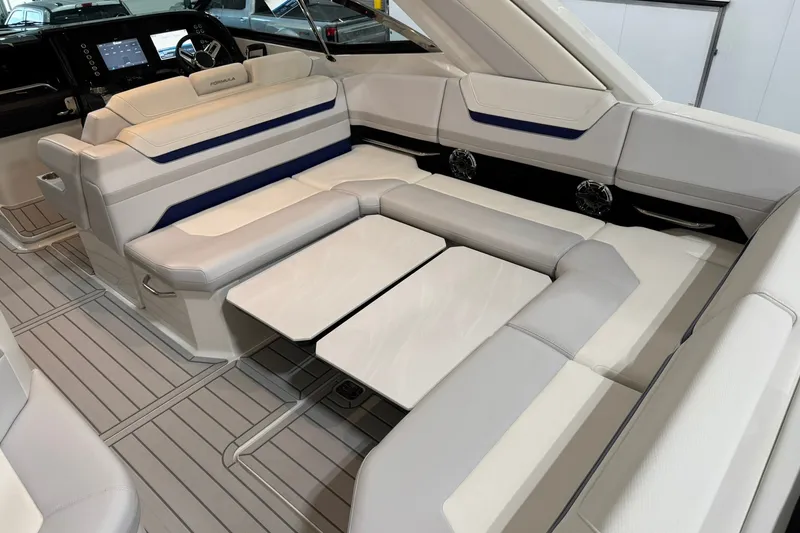 Slide: The Image of 2026 Formula 360 Crossover Bowrider I/O interior with luxurious seating and modern dashboard. - 57