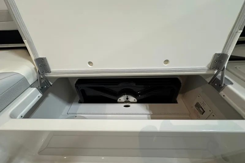 Slide: The Image of Open storage compartment in 2026 Formula 360 Crossover Bowrider I/O boat. - 56