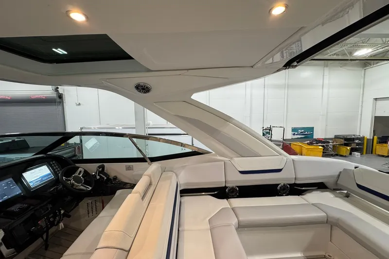 Slide: The Image of Interior view of 2026 Formula 360 Crossover Bowrider I/O, showcasing luxurious seating and dashboard. - 49
